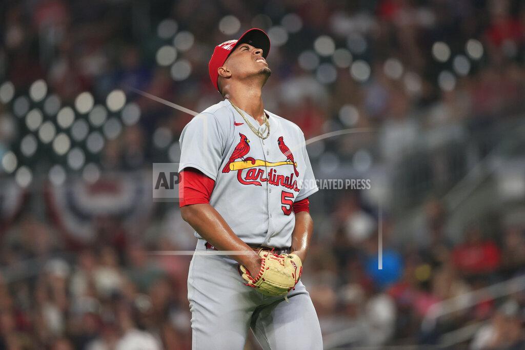 Butch Dill St. Louis Cardinals relief pitcher Johan Oviedo reacts after being hit by a line drive in the sixth inning of a baseball game against the Atlanta Braves, Monday, July 4, 2022, in Atlanta. (AP Photo/Butch Dill)