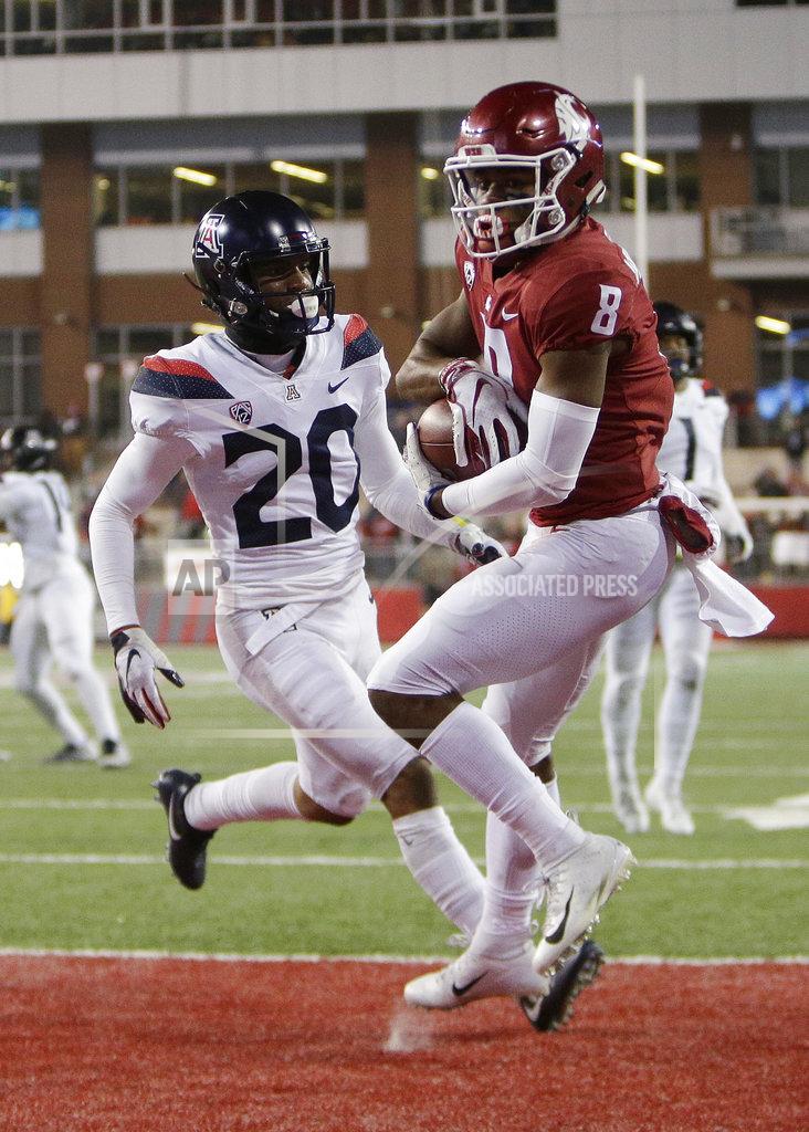 Young Kwak Washington State wide receiver Easop Winston Jr. (8) catches a pass for a touchdown in front of Arizona cornerback Azizi Hearn (20) during the second half of an NCAA college football game in Pullman, Wash., Saturday, Nov. 17, 2018. Washington State won 69-28. (AP Photo/Young Kwak)