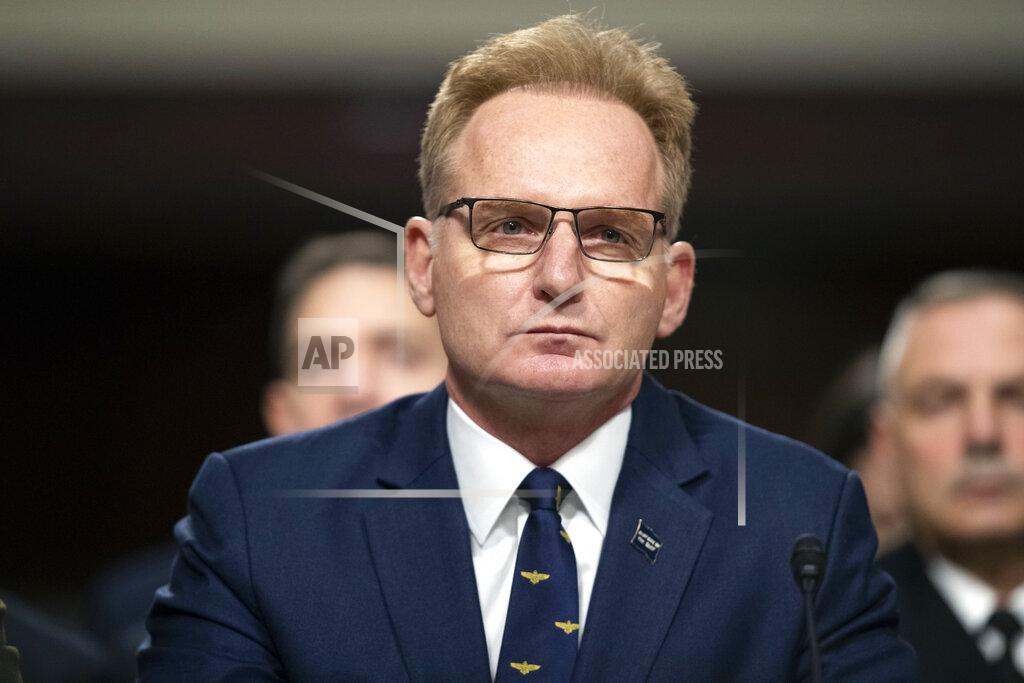 FILE - In this Dec. 3, 2019, file photo, acting Navy Secretary Thomas Modly testifies during a hearing of the Senate Armed Services Committee about about ongoing reports of substandard housing conditions in Washington, on Capitol Hill. Modly says the captain of the COVID-stricken aircraft carrier who was fired last week had betrayed his service and may have been “too naive or too stupid” to be commanding officer of the ship. Officials are confirming that Modly made the comments Sunday, April 5, 2020, to the ship's crew in Guam. (AP Photo/Alex Brandon, File)