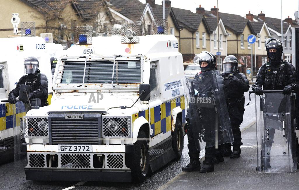 Peter Morrison Police block a road near the Peace Wall in West Belfast, Northern Ireland, Thursday, April 8, 2021. Authorities in Northern Ireland sought to restore calm Thursday after Protestant and Catholic youths in Belfast hurled bricks, fireworks and gasoline bombs at police and each other. It was the worst mayhem in a week of street violence in the region, where Britain's exit from the European Union has unsettled an uneasy political balance. (AP Photo/Peter Morrison)