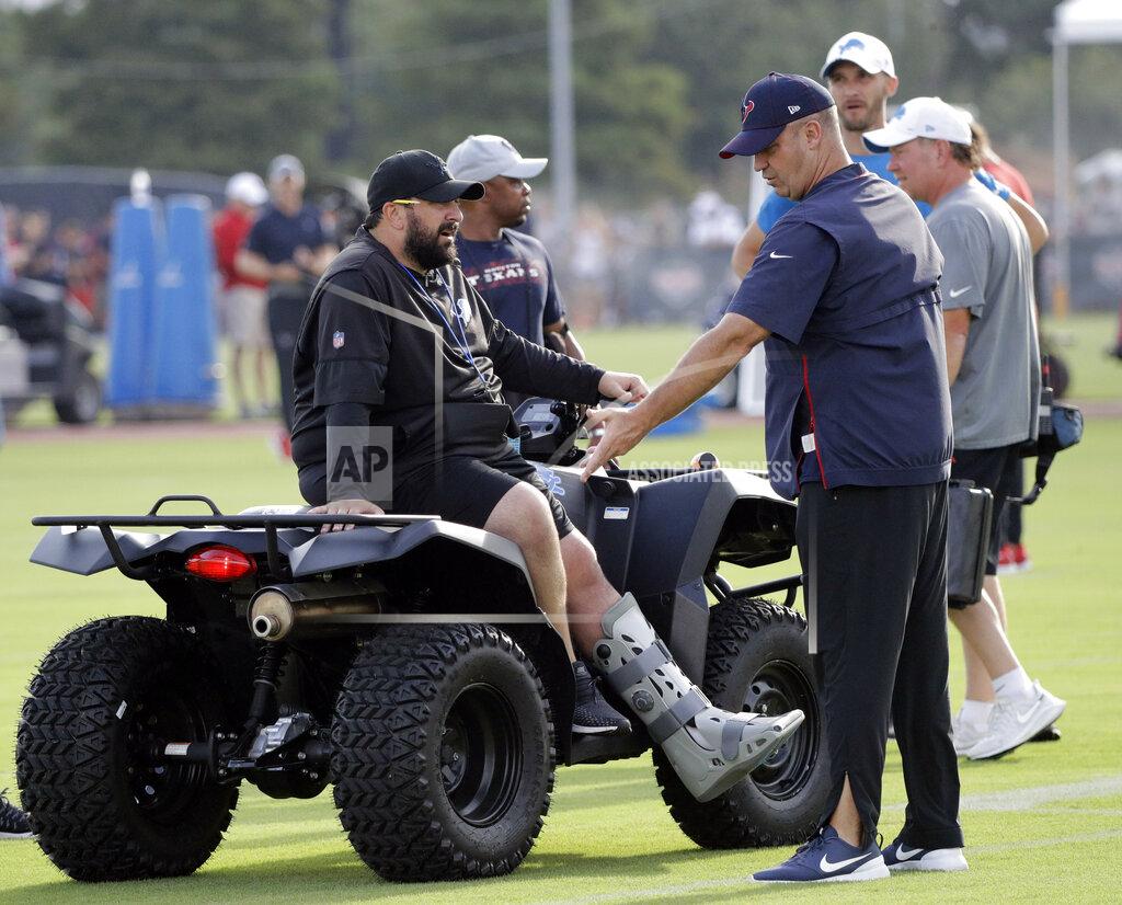 Detroit Lions coach Matt Patricia, left, talks with Houston Texans coach Bill O'Brien during an NFL football joint training camp practice Wednesday, Aug. 14, 2019, in Houston. (AP Photo/David J. Phillip)