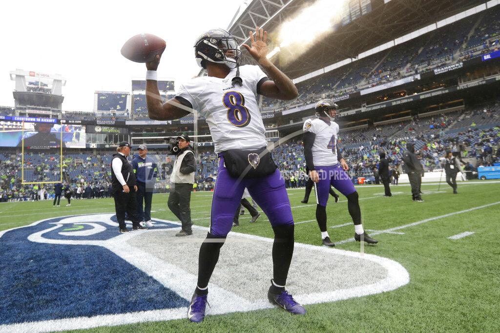 Elaine Thompson Baltimore Ravens quarterback Lamar Jackson warms up at CenturyLink Field before an NFL football game against the Seattle Seahawks, Sunday, Oct. 20, 2019, in Seattle. (AP Photo/Elaine Thompson)