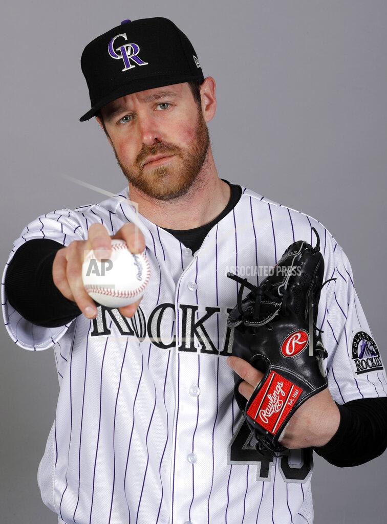 Darron Cummings FILE - This is a 2020 photo of Scott Oberg of the Colorado Rockies baseball team. Oberg is steadily making his way back to the mound after sitting out last season due to blood clots in his pitching arm. it was the third time over his career the clots have surfaced. (AP Photo/Darron Cummings, File)