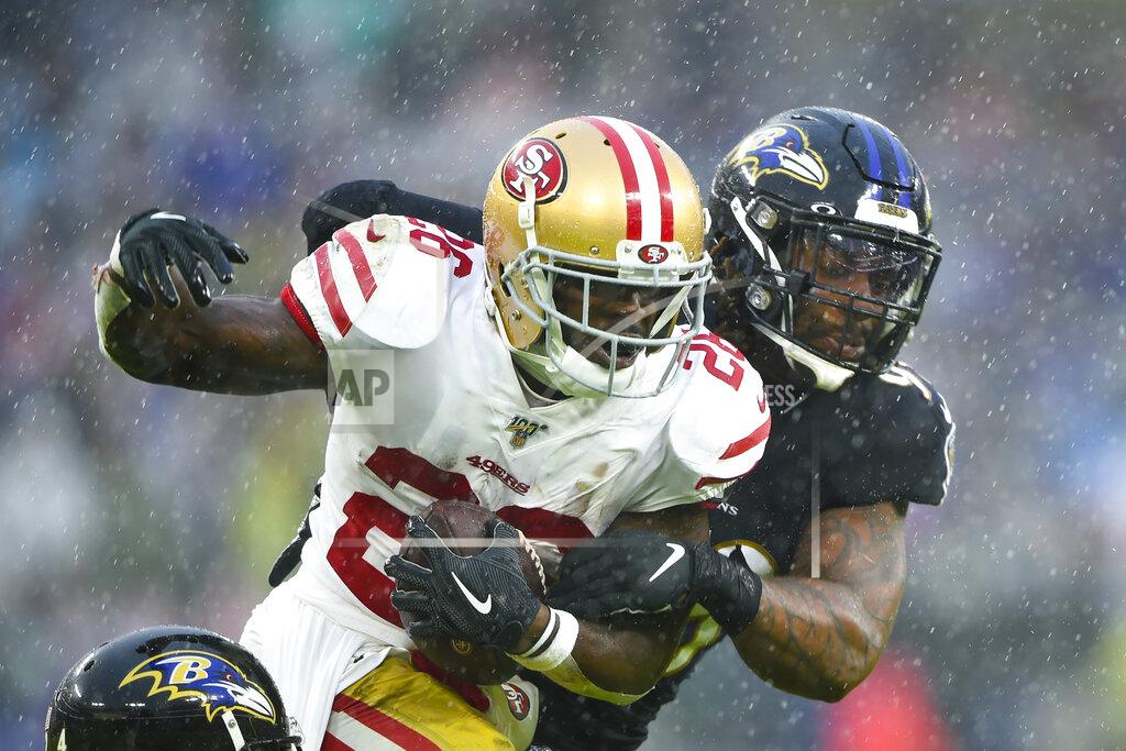 Gail Burton San Francisco 49ers running back Tevin Coleman (26) is taken down by Baltimore Ravens outside linebacker Matt Judon (99) in the first half of an NFL football game, Sunday, Dec. 1, 2019, in Baltimore, Md. (AP Photo/Gail Burton)
