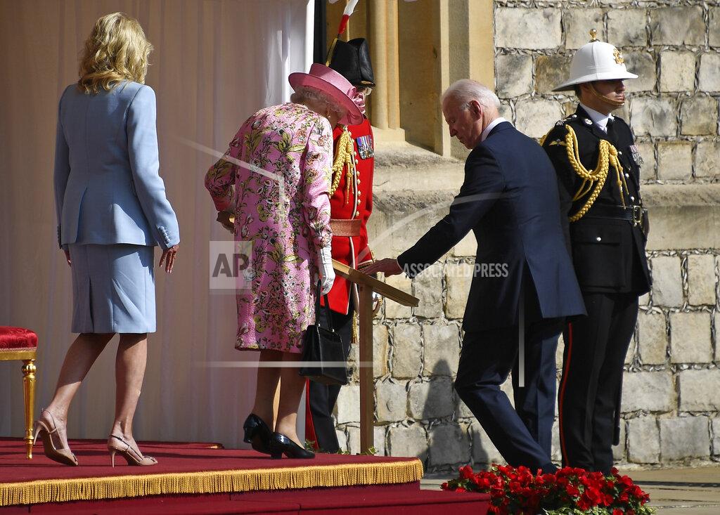Alberto Pezzali US President Joe Biden, First Lady Jill Biden and Britain's Queen Elizabeth II leave the dais after receiving Guard of Honour at Windsor Castle near London, Sunday, June 13, 2021. (AP Photo/Alberto Pezzali)