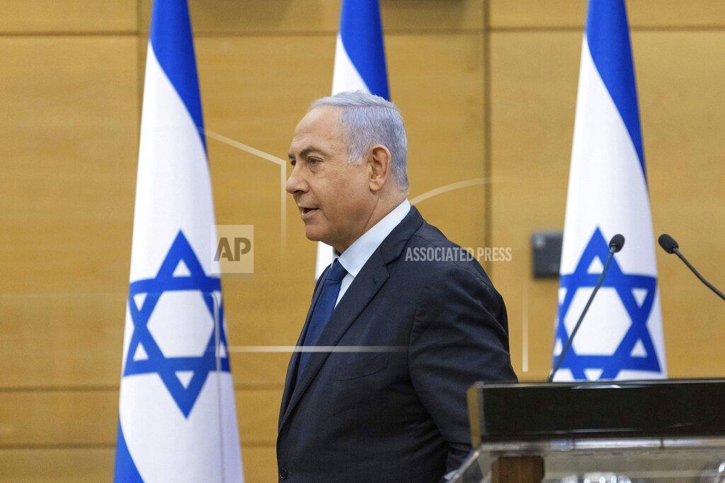 Yonatan Sindel FILE - In this May 30, 2021, file photo, Israeli Prime Minister Benjamin Netanyahu speaks to the Israeli Parliament in Jerusalem. If all goes according to plan, Israel will swear in a new government on Sunday, June 13, putting an end to Prime Minister Benjamin Netanyahu’s record 12-year rule and a political crisis that led to four elections in less than two years. (Yonatan Sindel/Pool via AP, File)