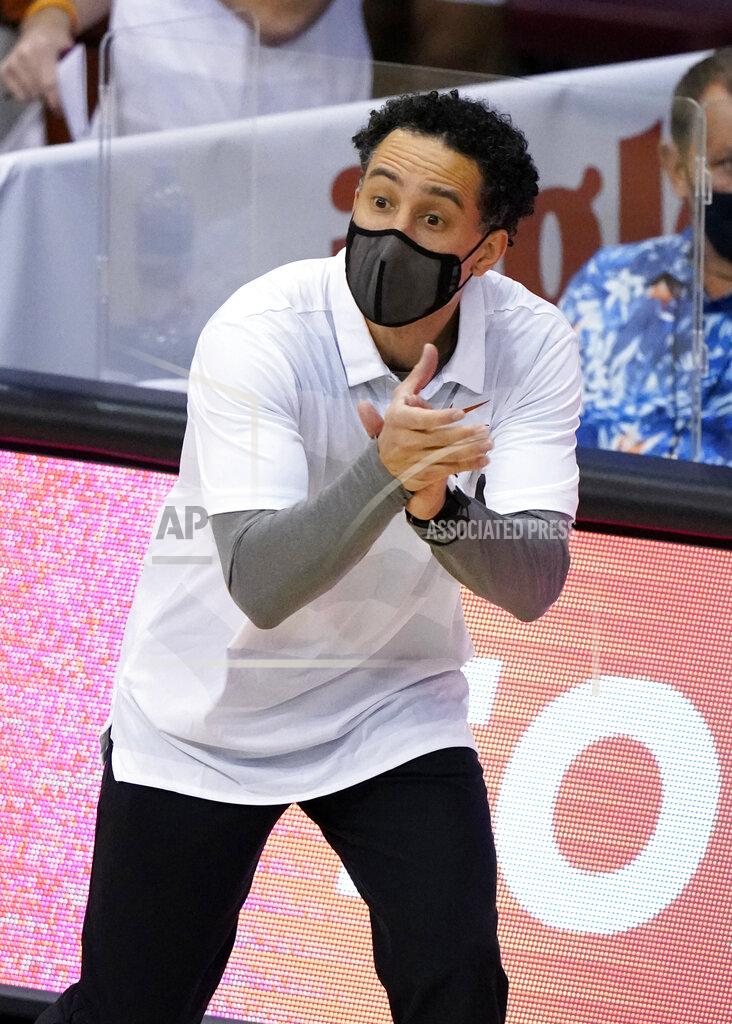 Kathy Kmonicek Texas coach Shaka Smart cheers his team on during the first half of an NCAA college basketball game against North Carolina for the championship of the Maui Invitational, Wednesday, Dec. 2, 2020, in Asheville, N.C. Texas won 69-67. (AP Photo/Kathy Kmonicek)