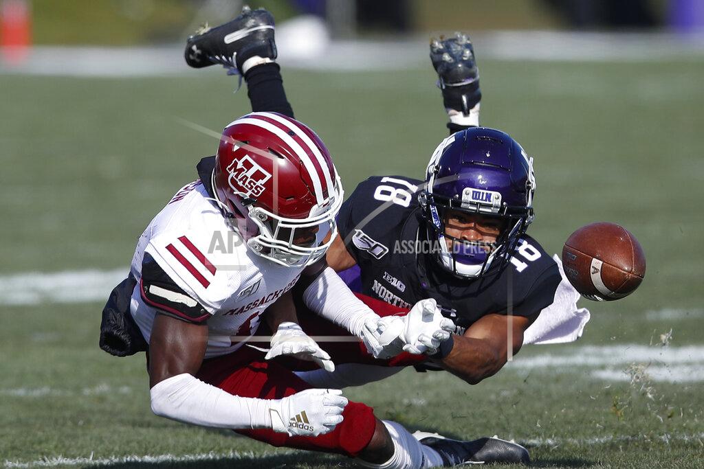 Jim Young Northwestern's Cameron Ruiz, right, breaks up a pass intended for Massachusetts' Jermaine Johnson Jr. during the first half of an NCAA college football game Saturday, Nov. 16, 2019, in Evanston, Ill. (AP Photo/Jim Young)