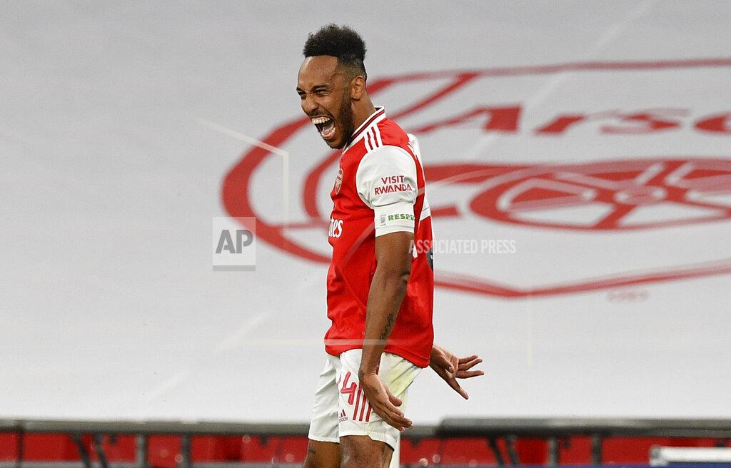 Justin Tallis Arsenal's Pierre-Emerick Aubameyang celebrates after scoring his team's second goal during the FA Cup semifinal soccer match between Arsenal and Manchester City at Wembley in London, England, Saturday, July 18, 2020. (AP Photo/Justin Tallis,Pool)