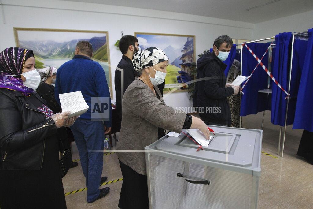 Musa Sadulayev People vote at a polling station during the Parliamentary elections in Grozny, Russia, Saturday, Sept. 18, 2021. Sunday will be the last of three days voting for a new parliament, but there seems to be no expectation that United Russia, the party devoted to President Vladimir Putin, will lose its dominance in the State Duma. (AP Photo/Musa Sadulayev)