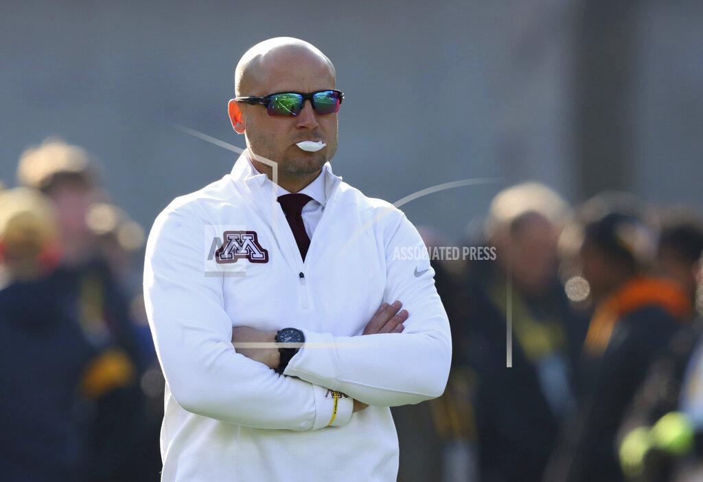 Matthew Putney Minnesota head coach P.J. Fleck watches warm ups before an NCAA college football game against Iowa, Saturday, Nov. 16, 2019, in Iowa City, Iowa. (AP Photo/Matthew Putney)