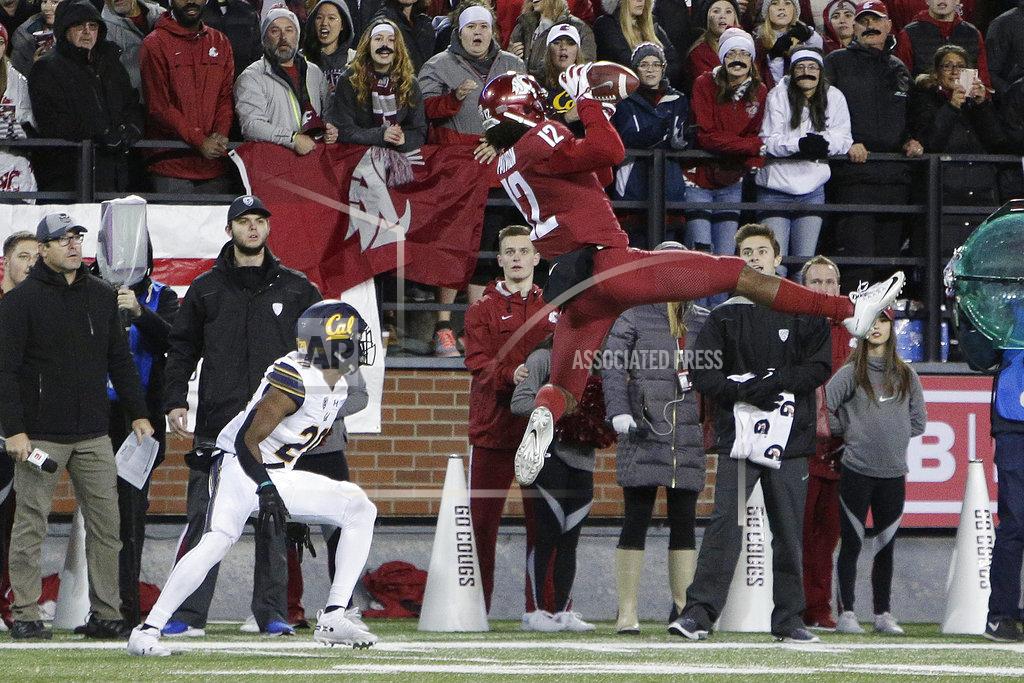 Young Kwak Washington State wide receiver Dezmon Patmon (12) catches a pass in front of California cornerback Josh Drayden during the first half of an NCAA college football game in Pullman, Wash., Saturday, Nov. 3, 2018. (AP Photo/Young Kwak)