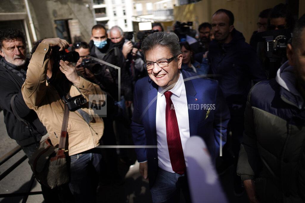 Daniel Cole FILE- French far-left candidate Jean-Luc Melenchon leaves after voting in the first round of the presidential election at a polling station, April 10, 2022 in Marseille, southern France. A month before the first round of voting, the campaign for the 577 seats in France’s lower house of parliament has been brutal. After losing to Macron in the April presidential election, far-right leader Marine Le Pen now faces a challenge from her political nemesis, hard-left leader Jean-Luc Melenchon who has set his sights on becoming prime minister. (AP Photo/Daniel Cole, File)