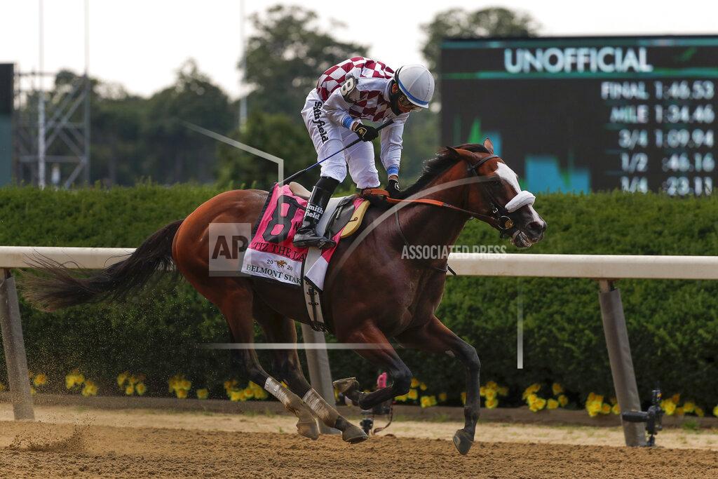 Seth Wenig Jockey Manny Franco reacts after winning the 152nd running of the Belmont Stakes horse race atop Tiz the Law, Saturday, June 20, 2020, in Elmont, N.Y. (AP Photo/Seth Wenig)