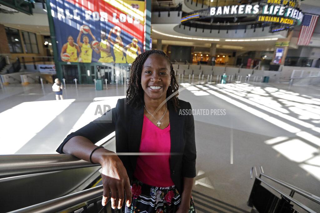 Darron Cummings FILE - In this June 26, 2019 file photo, Tamika Catchings poses for a photo inside Banker's Life Fieldhouse in Indianapolis. Catchings is part of a nine-person group announced Saturday, April 4, 2020, as this year’s class of enshrinees into the Naismith Memorial Basketball Hall of Fame. (AP Photo/Darron Cummings, File)