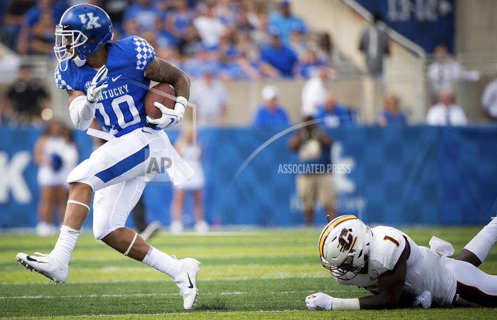 Bryan Woolston Kentucky running back Asim Rose (10) beats the tackle of Central Michigan defensive back Alonzo McCoy (1) to run for a 55-yard touchdown in the first quarter of an NCAA college football game in Lexington, Ky., Saturday, Sept. 1, 2018. (AP Photo/Bryan Woolston)
