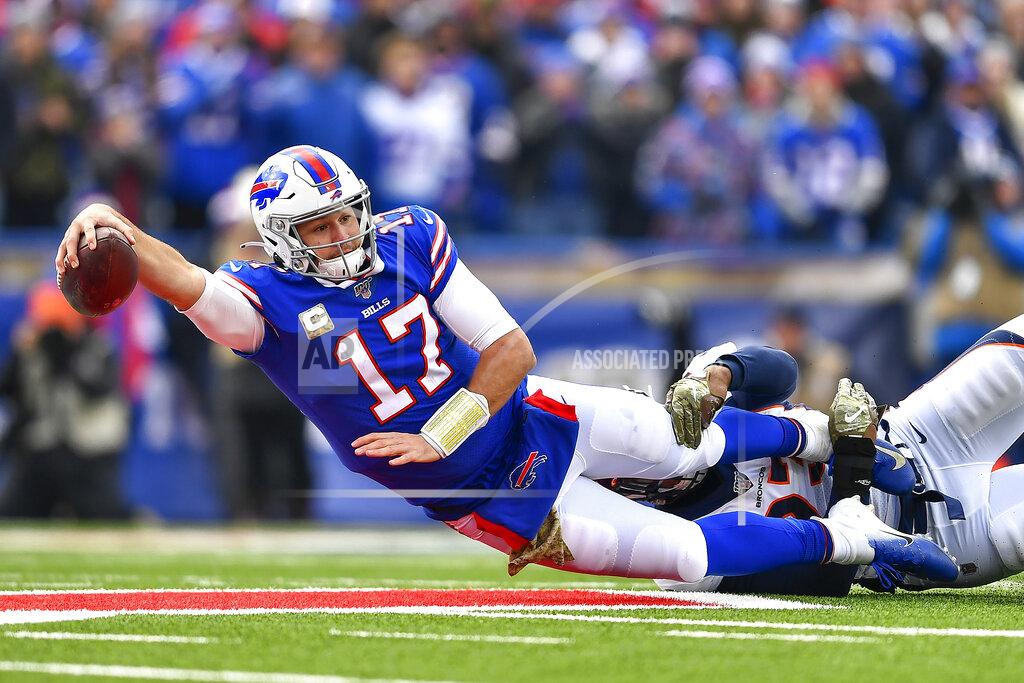 Adrian Kraus Buffalo Bills quarterback Josh Allen (17) is tackled by Denver Broncos defensive end Dre'Mont Jones (93) first quarter of an NFL football game, Sunday, Nov. 24, 2019, in Orchard Park, N.Y. (AP Photo/Adrian Kraus)