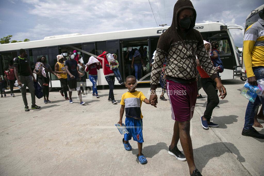 Rodrigo Abd Haitians who were deported from the United States arrive at the Toussaint Louverture International Airport, in Port au Prince, Haiti, Sunday, Sep. 19, 2021. (AP Photo/Rodrigo Abd)