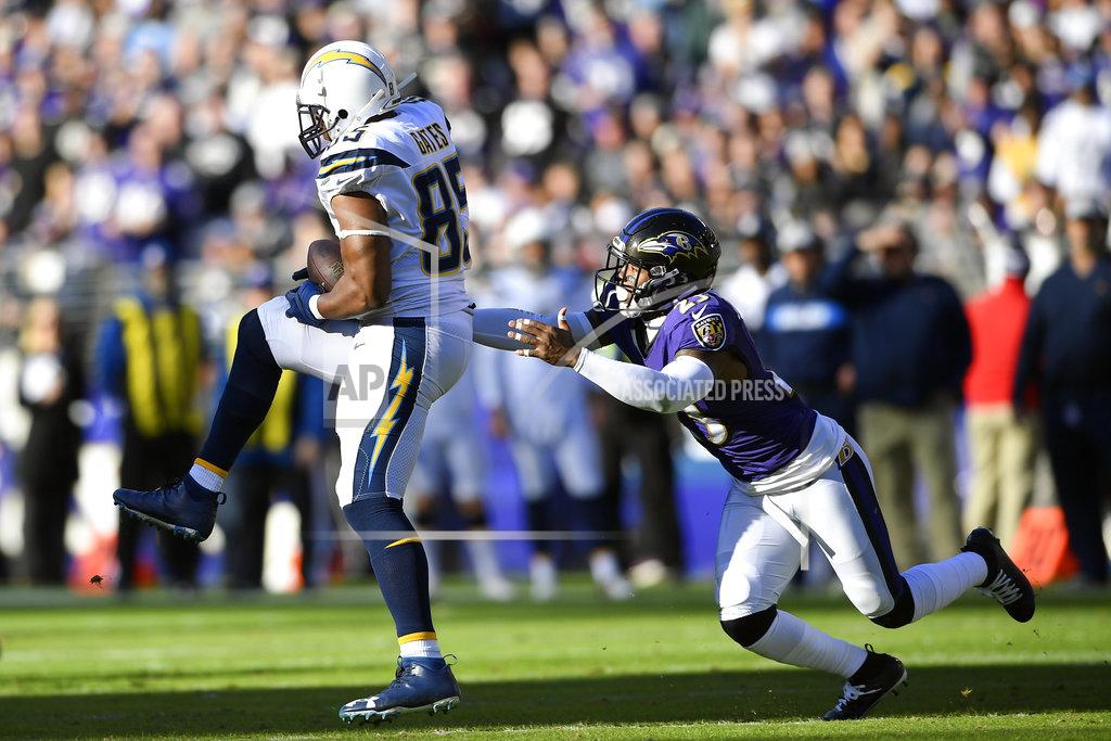 Nick Wass Los Angeles Chargers tight end Antonio Gates, left, catches a pass in front of Baltimore Ravens strong safety Tony Jefferson in the first half of an NFL wild card playoff football game, Sunday, Jan. 6, 2019, in Baltimore. (AP Photo/Nick Wass)
