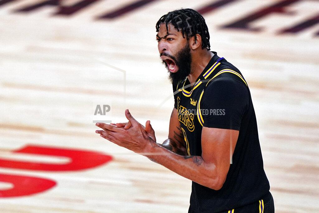 Mark J. Terrill FILE - In this Oct. 9, 2020, file photo, Los Angeles Lakers forward Anthony Davis celebrates during the second half in Game 5 of basketball's NBA Finals against the Miami Heat in Lake Buena Vista, Fla. Davis is the biggest name on the free agency board; he turned down his option for this season with the Lakers but isn’t expected to go anyplace else. (AP Photo/Mark J. Terrill, File)