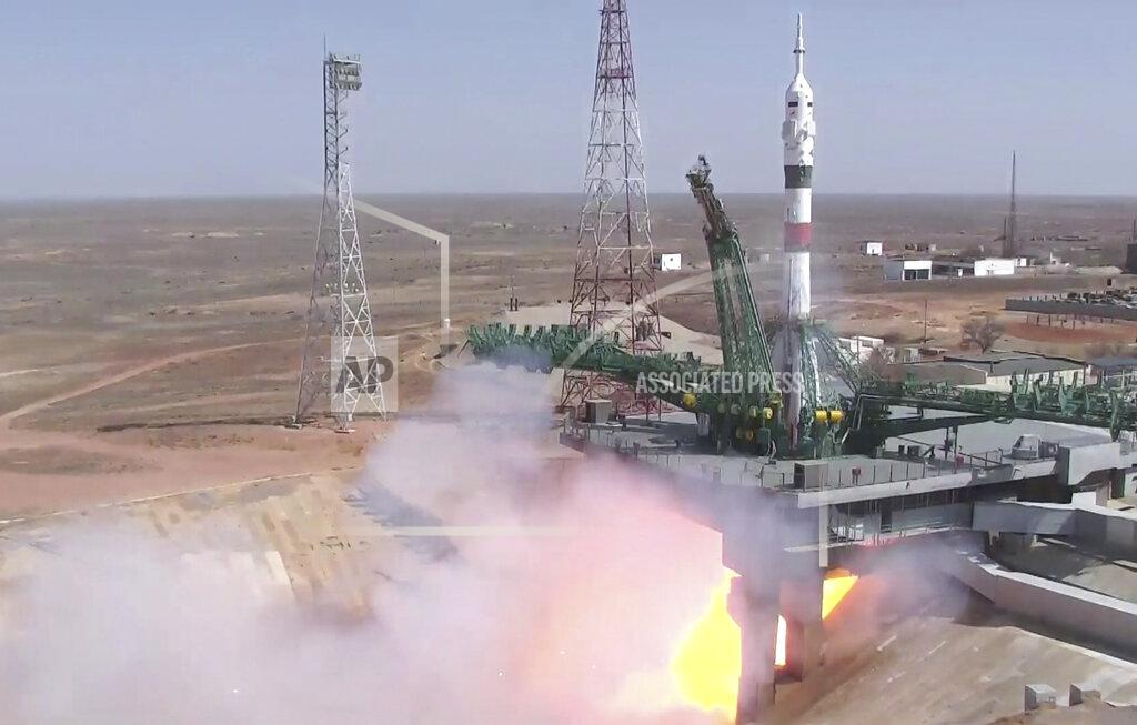 Uncredited In this photo taken from video footage released by the Roscosmos Space Agency, the Soyuz-2.1a rocket booster with Soyuz MS-18 space ship carrying a new crew to the International Space Station, ISS, blasts off at the Russian leased Baikonur cosmodrome, Kazakhstan, Friday, April 9, 2021. A Russian-U.S. trio of space travelers have launched successfully, heading for the International Space Station. NASA astronaut Mark Vande Hei and Russian cosmonauts Oleg Novitskiy and Pyotr Dubrov blasted off as scheduled at 12:42 p.m. (0742 GMT, 3:42 a.m. EDT) Friday aboard the Soyuz MS-18 spacecraft from the Russia-leased Baikonur launch facility in Kazakhstan. (Roscosmos Space Agency via AP)