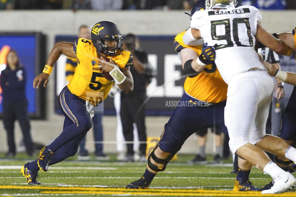 Don Feria California quarterback Brandon McIlwain (5) runs the ball against Oregon during the first half of an NCAA college football game Saturday, Sept. 29, 2018, in Berkeley, Calif. (AP Photo/Don Feria)