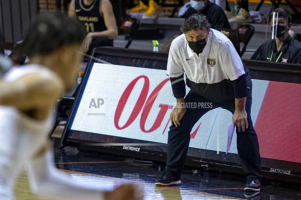 Mitch Alcala Oakland head coach Greg Kampe stands on the baseline in the first half of an NCAA college basketball game against Oklahoma State in Stillwater, Okla., Saturday, Dec. 5, 2020. (AP Photo/Mitch Alcala)