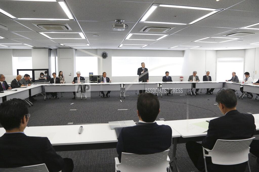 Tokyo 2020 Organizing Committee President Yoshiro Mori, center at rear, speaks during the first meeting of the “Tokyo 2020 New Launch Task Force" in Tokyo, Thursday, March 26, 2020, two days after the unprecedented postponement was announced due to the spreading coronavirus. The new Tokyo Olympics need dates for the opening and closing ceremony in 2021. Nothing moves until this is worked out by the International Olympic Committee, the Japanese government, and Tokyo organizers.(AP Photo/Koji Sasahara)