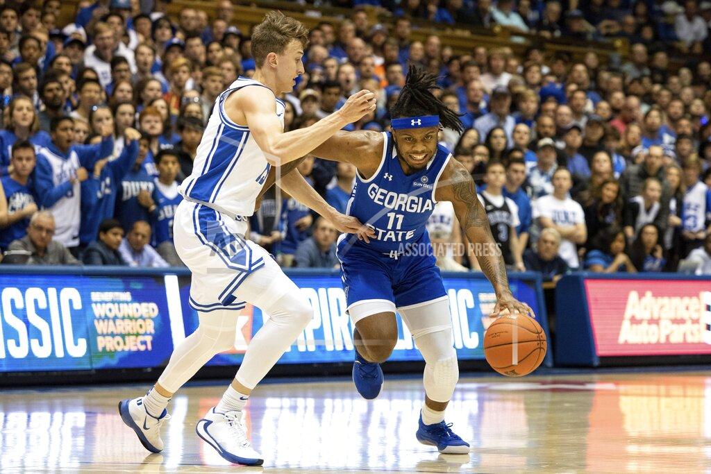 Ben Mckeown Georgia State's Corey Allen (11) drives against Duke's Alex O'Connell, left, during the first half of an NCAA college basketball game in Durham, N.C., Friday, Nov. 15, 2019. (AP Photo/Ben McKeown)