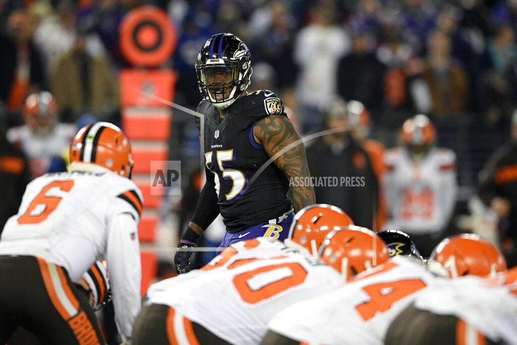 FILE - In this Sunday, Dec. 30, 2018 file photo,Baltimore Ravens outside linebacker Terrell Suggs (55) looks across the line of scrimmage in the second half of an NFL football game against the Cleveland Browns in Baltimore. Defense is the area with the most depth in this year's free agency class, Monday, March 11, 2019. (AP Photo/Nick Wass, File)