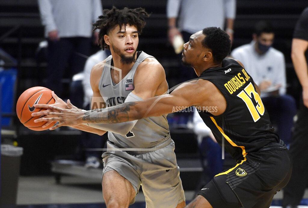 Abby Drey VCU's Corey Douglas Jr. tries to block Penn State's Seth Lundy as he looks for an open teammate during an NCAA college basketball game Wednesday, Dec. 2, 2020, in State College, Pa. (Abby Drey/Centre Daily Times via AP)