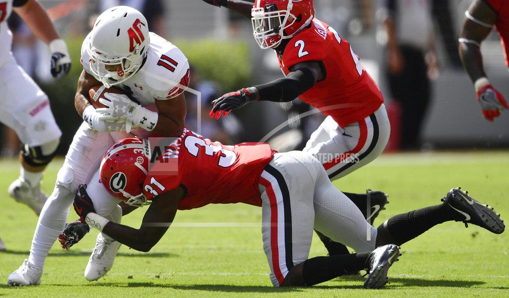 Mike Stewart Austin Peay wide receiver DeAngelo Wilson (11) runs into Georgia defensive back William Poole (31) during the first half of an NCAA college football game, Saturday, Sept. 1, 2018, in Athens, Ga. (AP Photo/Mike Stewart)
