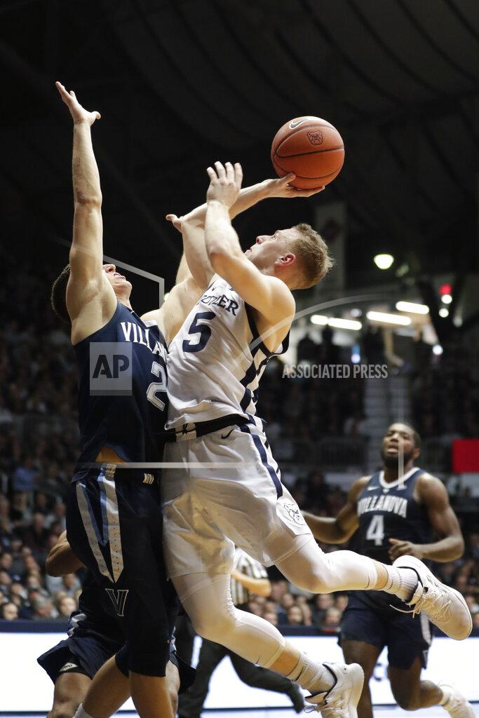 Michael Conroy Butler guard Paul Jorgensen (5) shoots over Villanova guard Collin Gillespie (2) in the second half of an NCAA college basketball game in Indianapolis, Tuesday, Jan. 22, 2019. Villanova defeated Butler 80-72. (AP Photo/Michael Conroy)