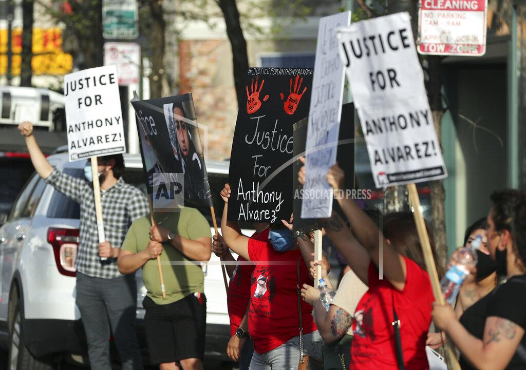 Terrence Antonio James Protesters call for justice in the shooting death of Anthony Alvarez outside the headquarters of the Civilian Office of Police Accountability on Tuesday, April 27, 2021. Chicago’s independent police review board has released video of the 22-year-old Latino man who was shot in the back late last month during a foot chase. (Jose M. Osorio /Chicago Tribune via AP)