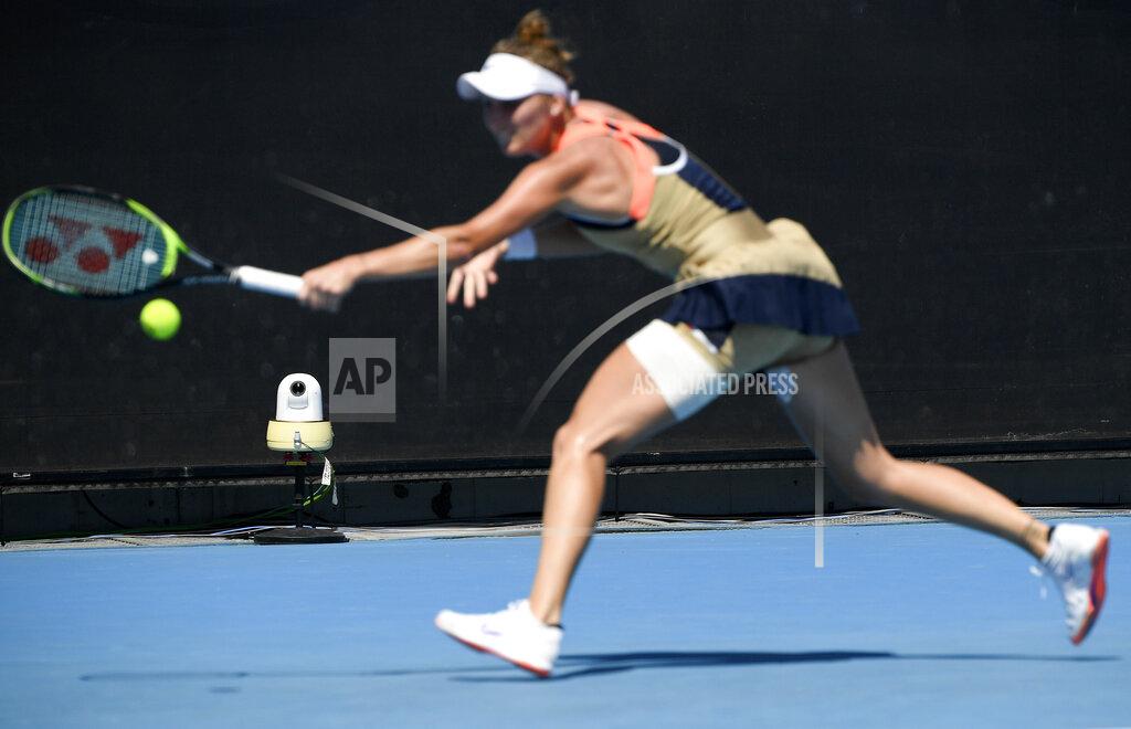 Andy Brownbill A line camera films as Marketa Vondrousova of the Czech Republic makes a backhand return during her second round match against Canada's Rebecca Marino at the Australian Open tennis championship in Melbourne, Australia, Wednesday, Feb. 10, 2021. Eliminating all line judges and removing the human element from officiating at the Australian Open might have been a necessary step to reduce the number of people on court amid a pandemic. It also might be good for the integrity of the game, because getting every call right matters so much to players and fans. (AP Photo/Andy Brownbill)