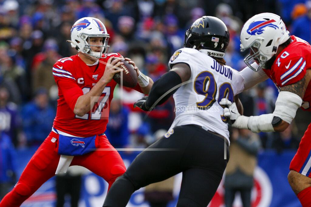 John Munson Buffalo Bills quarterback Josh Allen (17) looks to pass under pressure by Baltimore Ravens outside linebacker Matt Judon (99) during the second half of an NFL football game against the Baltimore Ravens in Orchard Park, N.Y., Sunday, Dec. 8, 2019. (AP Photo/John Munson)