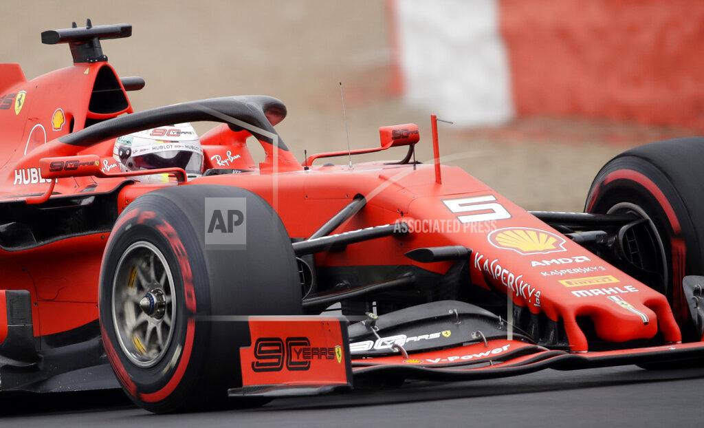 FILE - In this file photo dated Saturday, July 13, 2019, Ferrari driver Sebastian Vettel of Germany steers his car during the third free practice at the Silverstone racetrack, in Silverstone, England. Given Vettel's recent lack of form the last place he might want to race upcoming weekend is his home Grand Prix in Hockenheim, Germany. (AP Photo/Luca Bruno, FILE)
