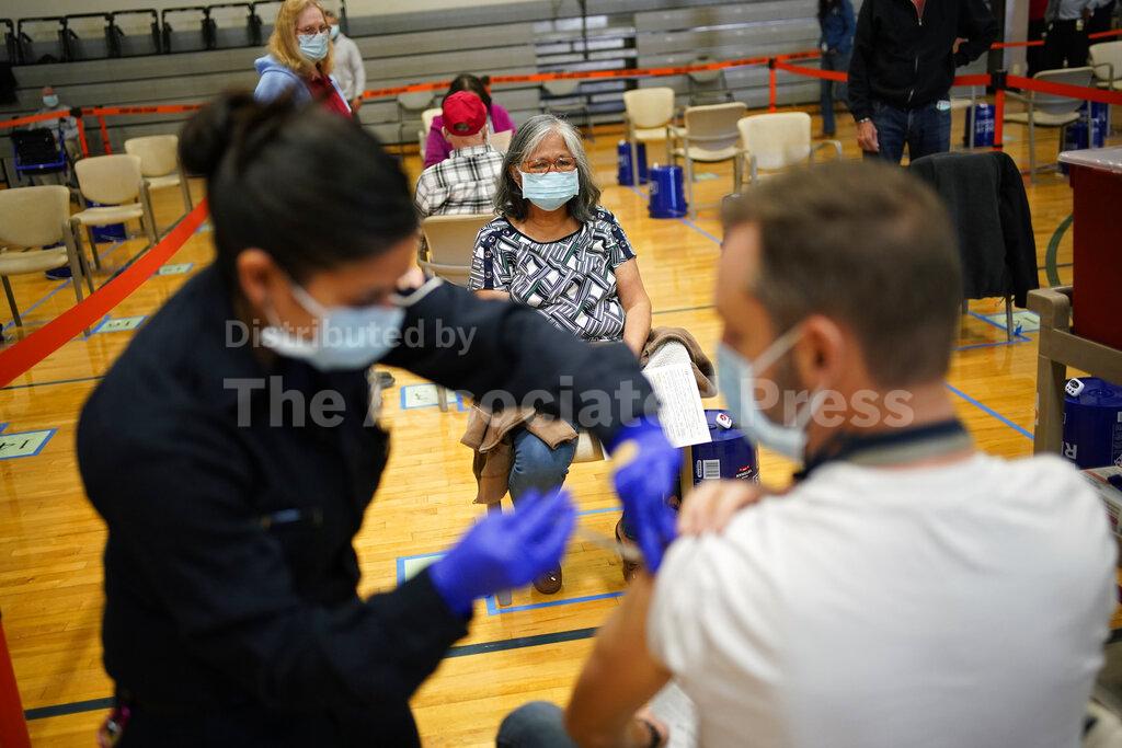 The Latest: Nevada to offer vaccines to everyone over 16 from April 5