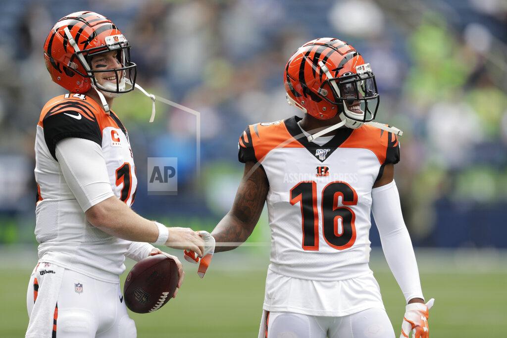Stephen Brashear Cincinnati Bengals quarterback Andy Dalton, left, talks with wide receiver Pharoh Cooper (16) before an NFL football game against the Seattle Seahawks, Sunday, Sept. 8, 2019, in Seattle. (AP Photo/Stephen Brashear)