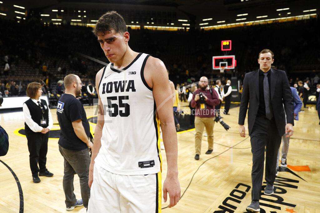 Charlie Neibergall Iowa center Luka Garza walks off the court after the team's NCAA college basketball game against Purdue, Tuesday, March 3, 2020, in Iowa City, Iowa. Purdue won 77-68. (AP Photo/Charlie Neibergall)