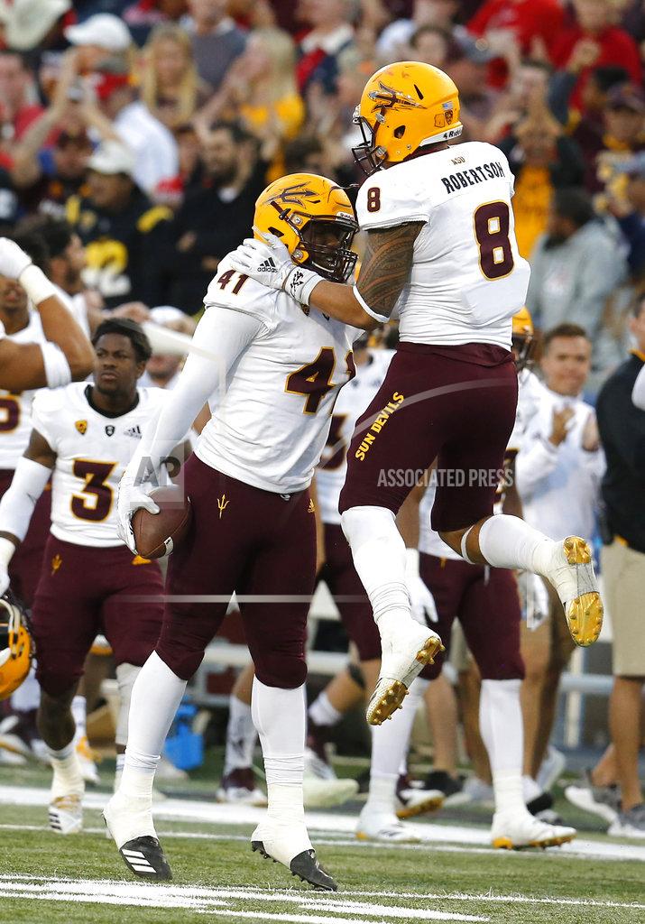 Rick Scuteri Arizona State defensive lineman Tyler Johnson (41) celebrates with Arizona State linebacker Merlin Robertson (8) after recovering a fumble in the second half during an NCAA college football game against Arizona, Saturday, Nov. 24, 2018, in Tucson, Ariz. (AP Photo/Rick Scuteri)