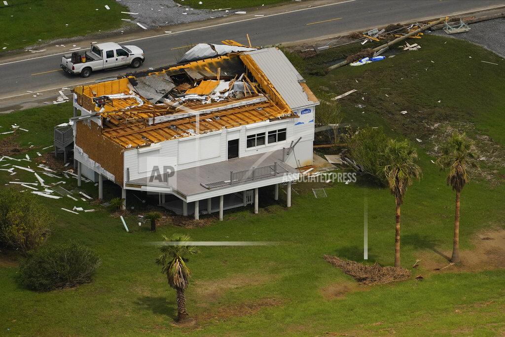 Matt Slocum In this aerial photo, the remains of a damaged home are seen in the aftermath of Hurricane Ida, Monday, Sept. 6, 2021, in Grand Isle, La. (AP Photo/Matt Slocum)