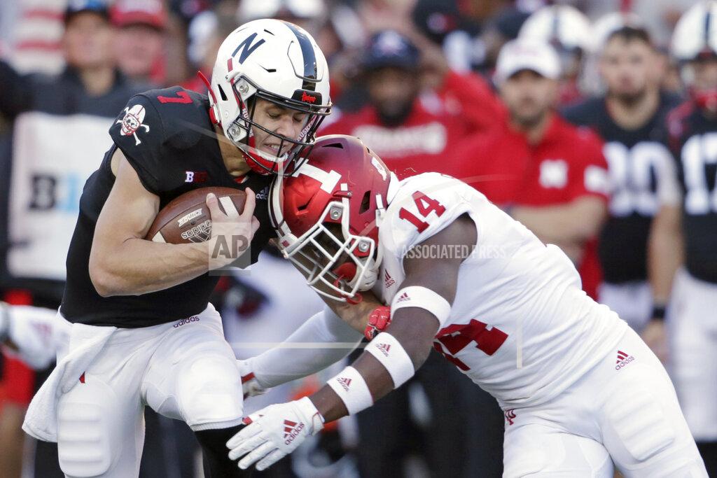 Nati Harnik Indiana defensive back Andre Brown Jr. (14) tackles Nebraska quarterback Luke McCaffrey (7) during the second half of an NCAA college football game in Lincoln, Neb., Saturday, Oct. 26, 2019. Indiana won 38-31. (AP Photo/Nati Harnik)