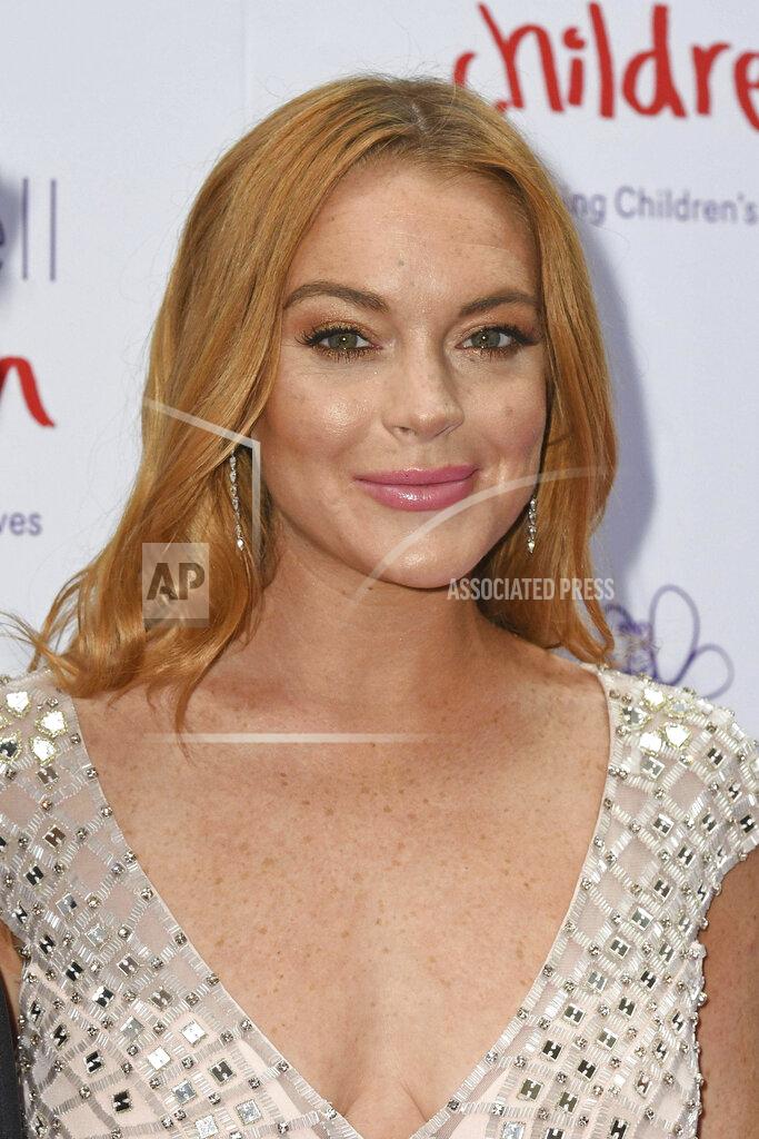 Lindsay Lohan engaged to Dubai banker Bader Shammas - 11/28/21