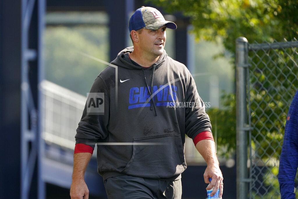 Steven Senne New York Giants head coach Joe Judge steps on the field at the start of a joint NFL football practice with the New England Patriots, Wednesday, Aug. 25, 2021, in Foxborough, Mass. (AP Photo/Steven Senne)