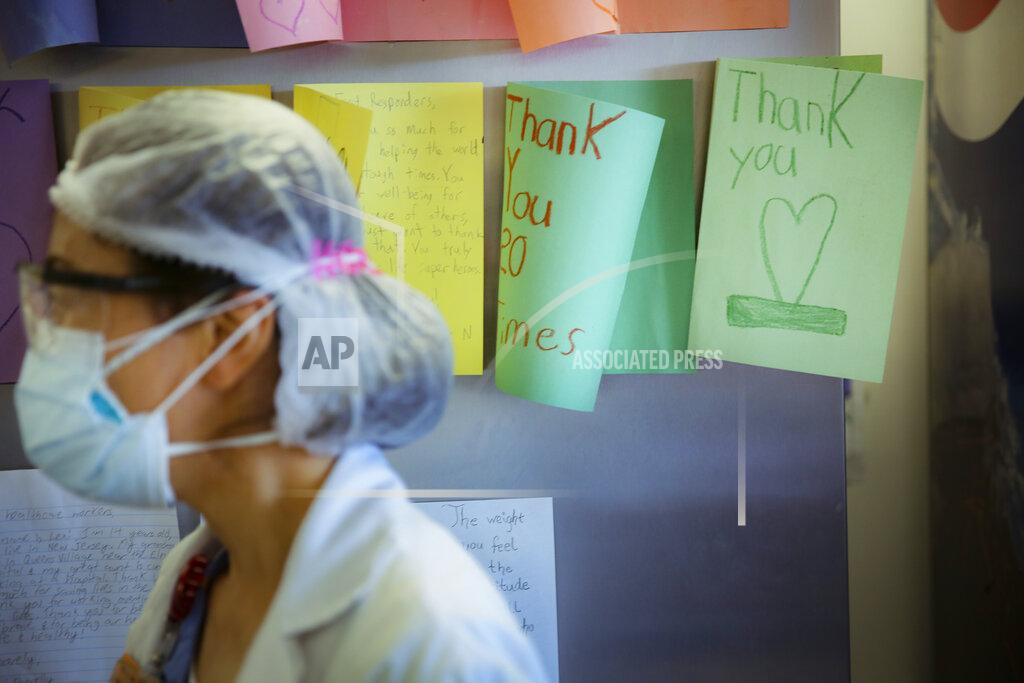 Robert Bumsted FILE - In this May 29, 2020, file photo, letters of thanks from students adorn the walls of a break room that was set up for workers to decompress from the stresses of caring for COVID-19 patients at Elmhurst Hospital, in New York. As the coronavirus pandemic surges across the nation and infections and hospitalizations rise, medical administrators are scrambling to find enough nursing help — especially in rural areas and at small hospitals. (AP Photo/Robert Bumsted, File)