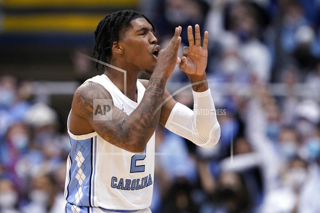 Gerry Broome North Carolina guard Caleb Love (2) reacts following a basket against North Carolina State during the second half of an NCAA college basketball game in Chapel Hill, N.C., Saturday, Jan. 29, 2022. (AP Photo/Gerry Broome)