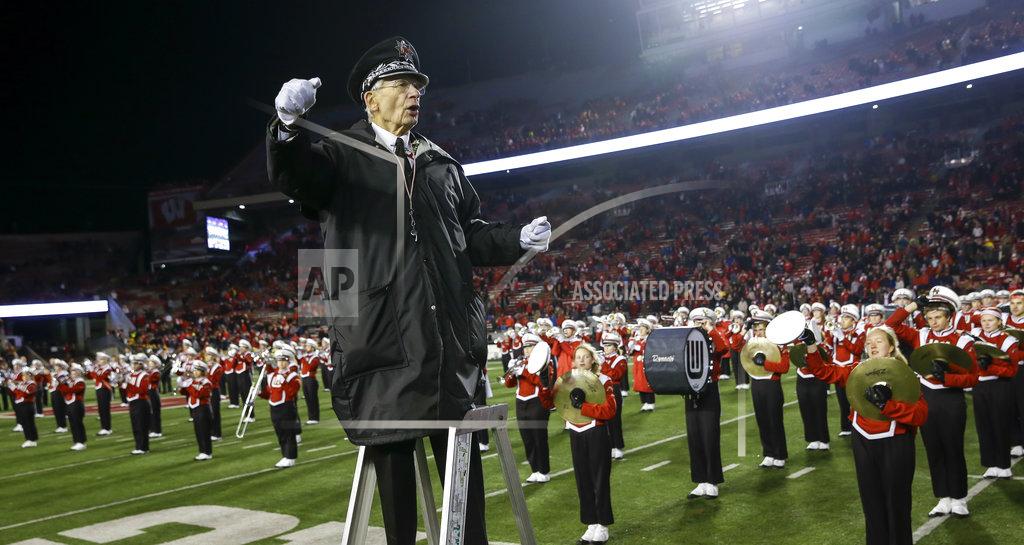 Andy Manis University of Wisconsin-Madison Marching Band Director Mike Leckrone directs the band after an NCAA college football game Saturday, Nov. 24, 2018, in Madison, Wis. Leckrone is retiring after 50 years of directing the UW band. Minnesota beat Wisconsin 37-15. (AP Photo/Andy Manis)