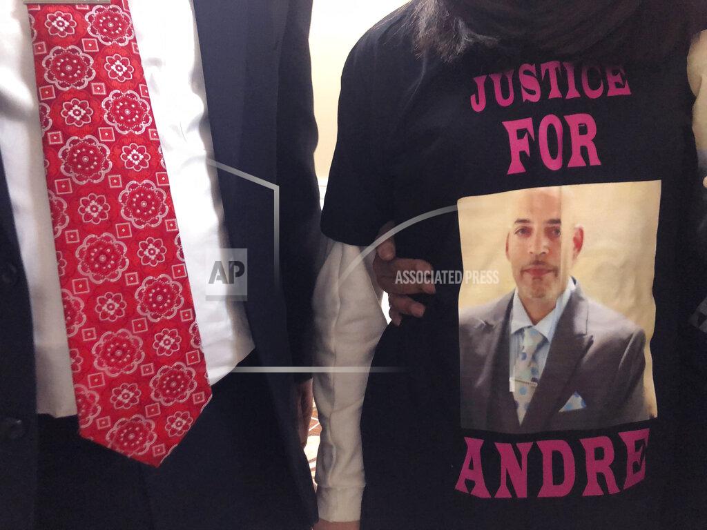 Andre Hill, fatally shot by Columbus police on Dec. 22, is memorialized on a shirt worn by his daughter, Karissa Hill, on Thursday, Dec. 31, 2020, in Columbus, Ohio. Karissa Hill said she considered her father an “everything man” because he did so many things. (AP Photo/Andrew Welsh-Huggins)