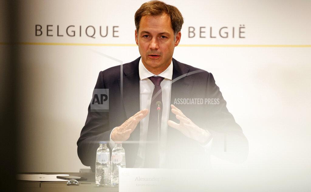 Olivier Matthys Belgium's Prime Minister Alexander De Croo speaks during a media conference after a Belgian government meeting to discuss coronavirus, COVID-19, measures in Brussels, Tuesday, May 11, 2021. (AP Photo/Olivier Matthys, Pool)